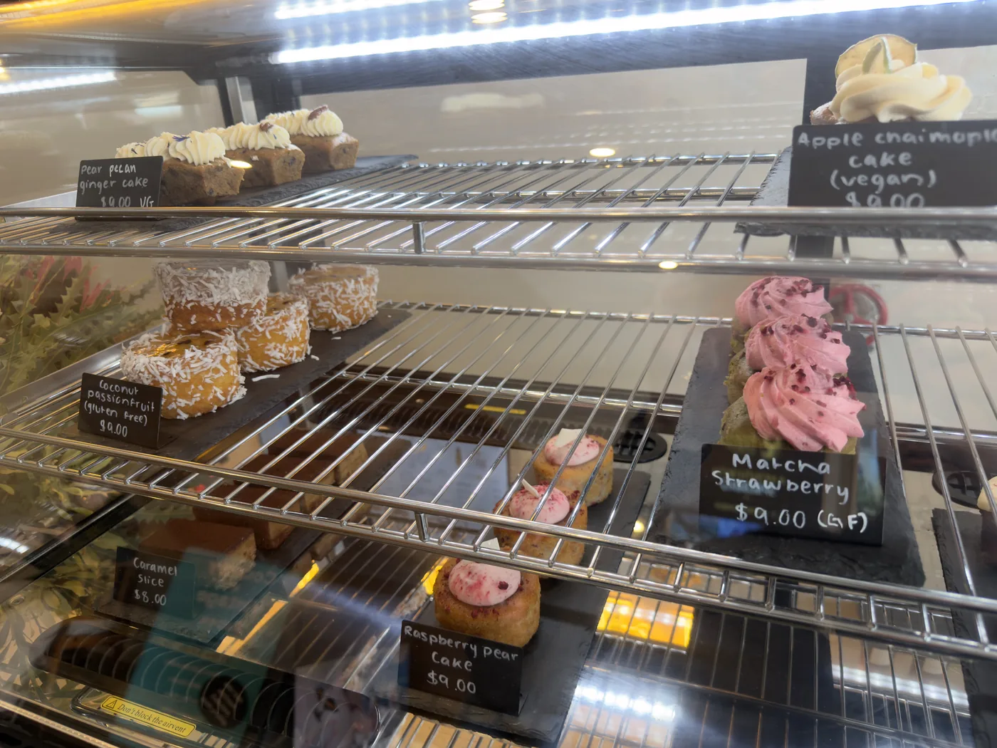 The cake cabinet, with the day&rsquo;s cakes and slices